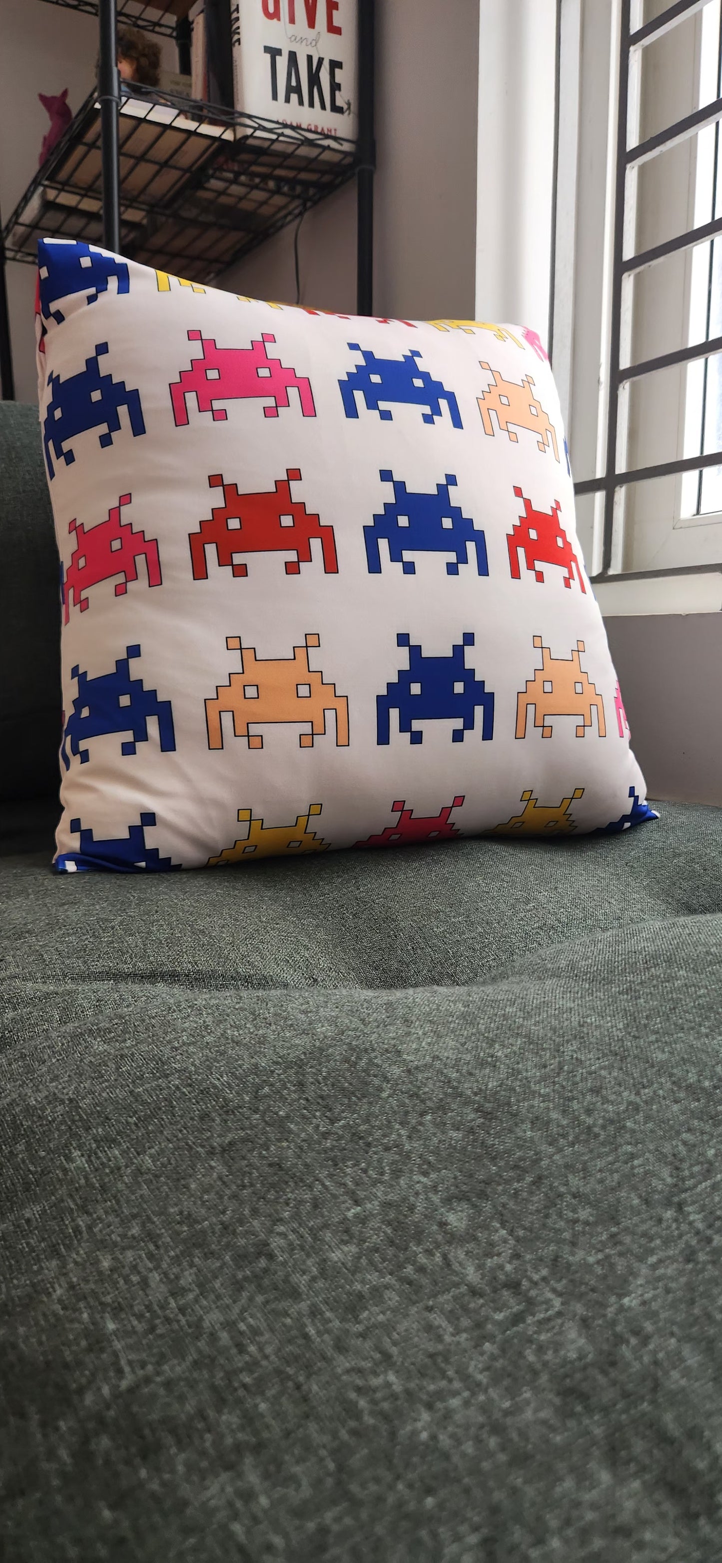 Arcade gaming inspired cushion cover with space monsters made using 8 bits